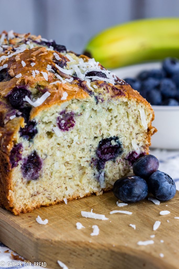 Blueberry Coconut Banana Bread - Recipe for homemade quick bread with blueberries, sweet coconut and banana makes an easy loaf. Fruit and coconut combination is perfect! 