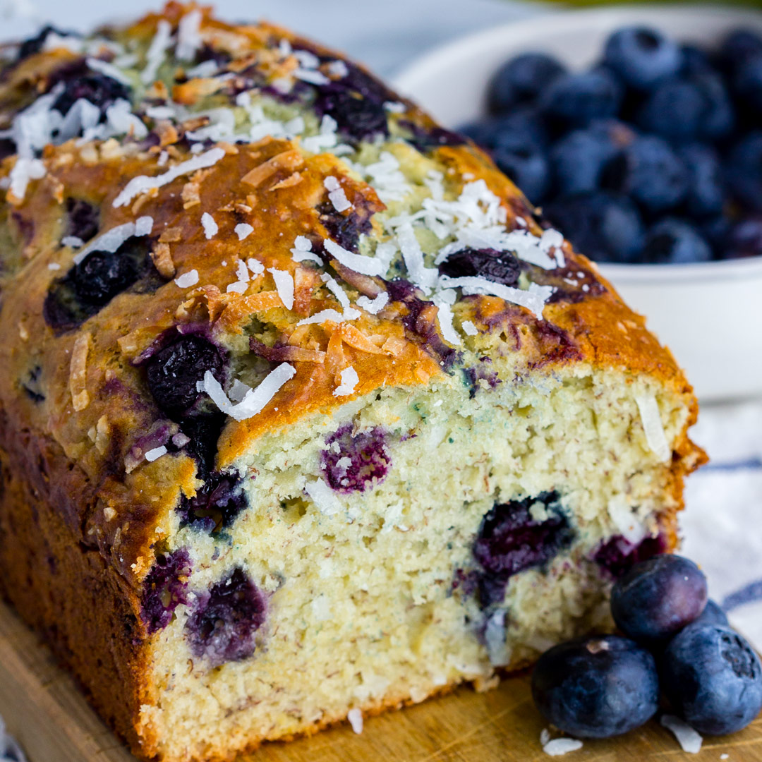 Blueberry Coconut Banana Bread - Recipe for homemade quick bread with blueberries, sweet coconut and banana makes an easy loaf. Fruit and coconut combination is perfect!