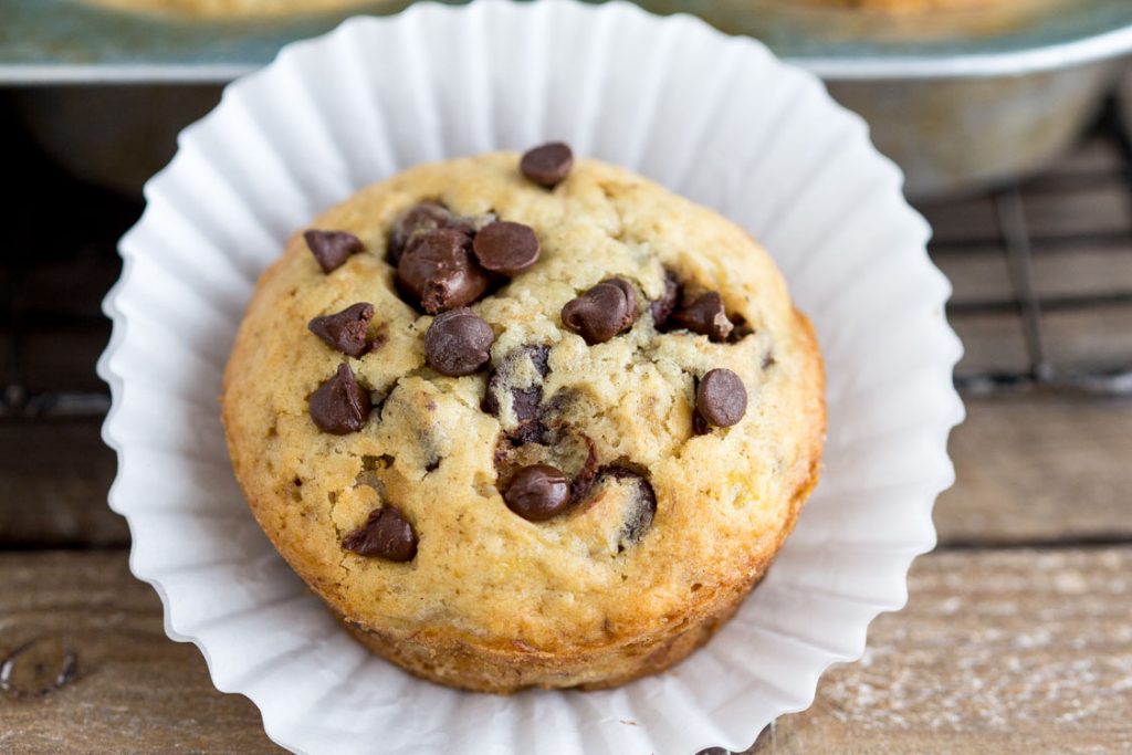 Banana Chocolate Chip muffins - Bakery style Homemade muffins. Perfect for breakfast or snack. These are a family FAVORITE! 