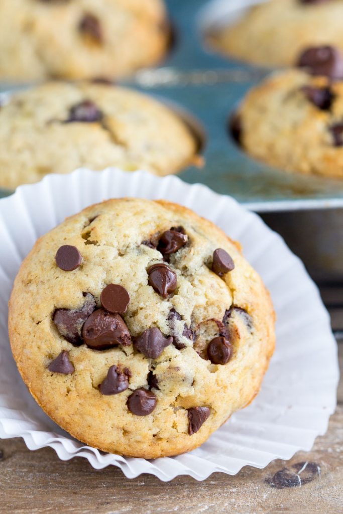 Banana Chocolate Chip muffins - Bakery style Homemade muffins. Perfect for breakfast or snack. These are a family FAVORITE! 