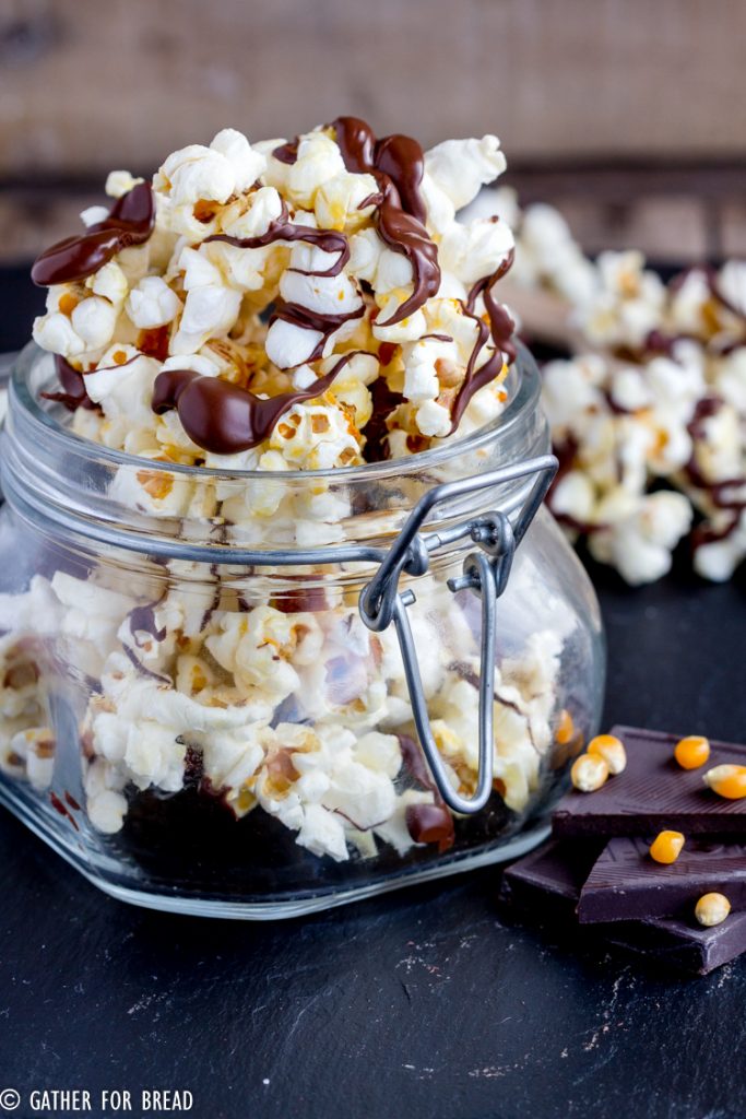 Chocolate Drizzled Kettle Corn - Simple kettle corn drizzled with dark chocolate for an easy snack. Great for gifting and snacking. Homemade in minutes.