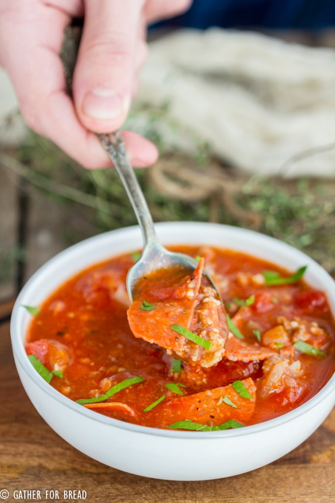 Pizza Soup loaded with sausage and pepperoni - This easy cheesy soup is made with pizza sauce and mozzarella cheese. Family friendly, low carb favorite for a quick meal!