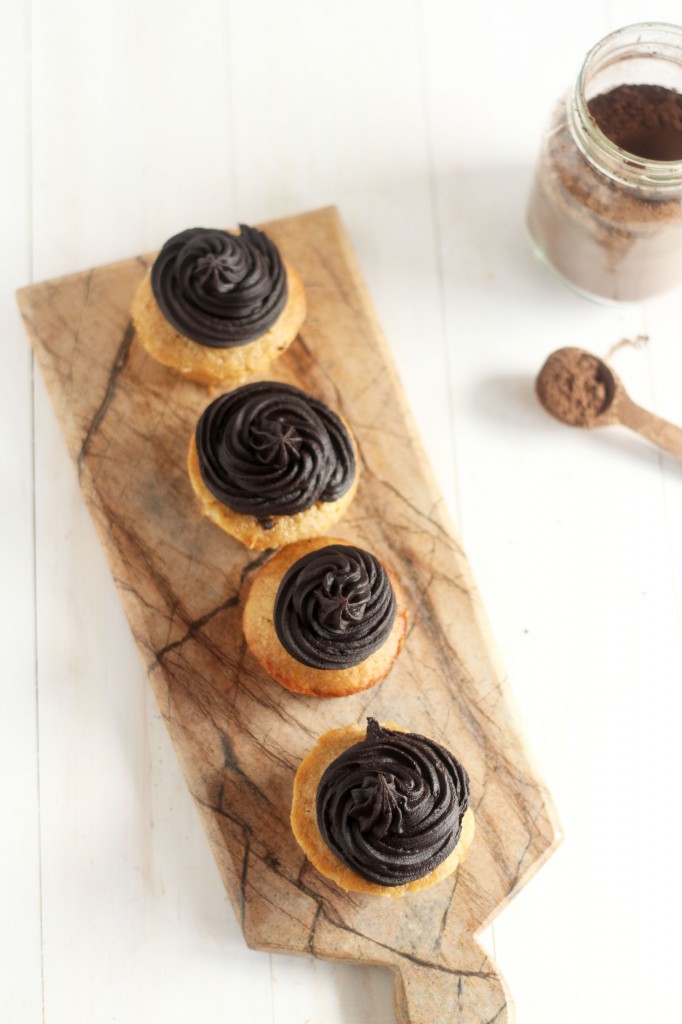 Banana Cupcakes with Dark chocolate frosting. These super soft cupcakes have the best flavor of banana and rich dark chocolate. Amazing!