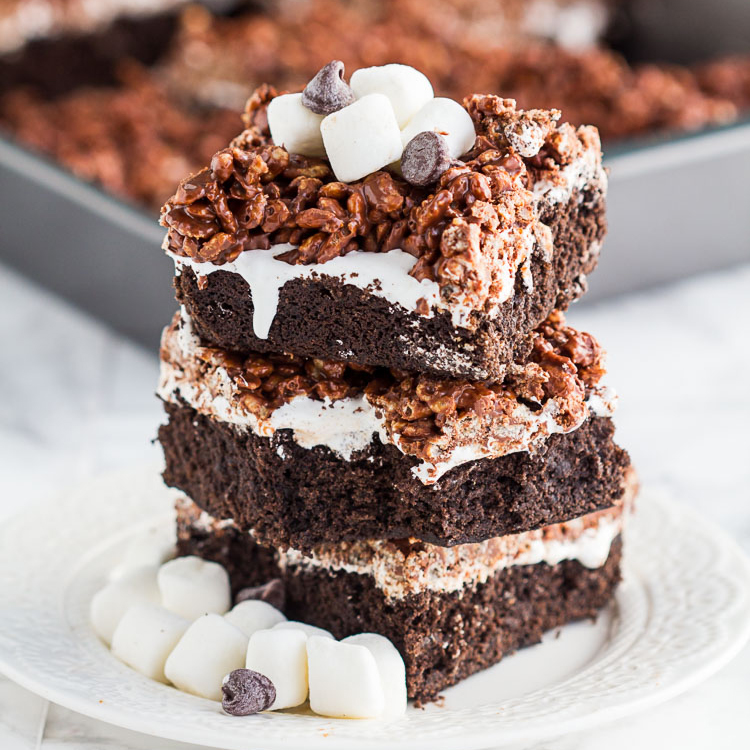 Chocolate Crunch Brownies - Brownies layered with marshmallow cream and chocolate peanut butter Krispies . Homemade killer crunch brownies are a family favorite.
