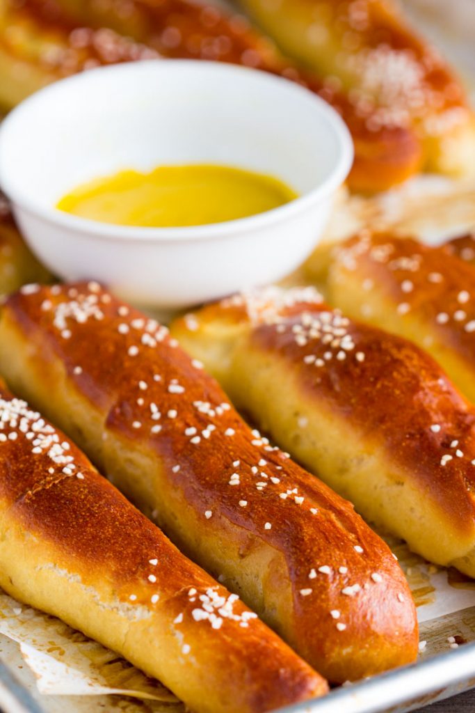 German Soft Pretzel Sticks - How to make homemade slightly sweet golden soft pretzel sticks with yeast. Makes enough for a crowd as an appetizer and great for the big game.