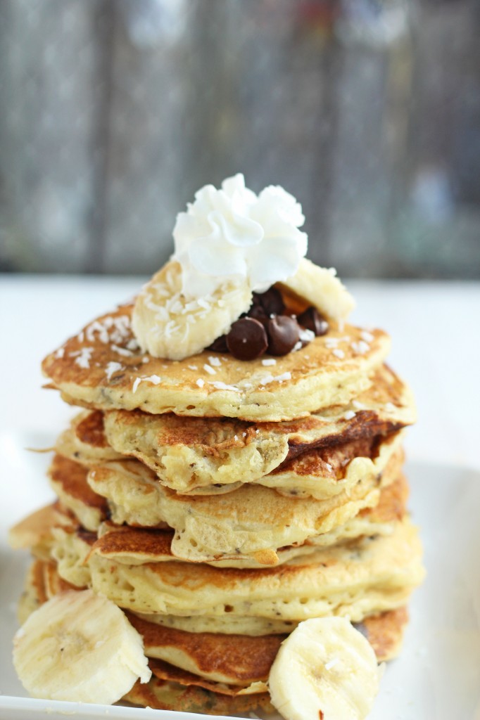 Banana Coconut Chocolate Chip Pancakes -- light and fluffy banana pancakes bursting with bites of coconut and chocolate. | gatherforbread.com
