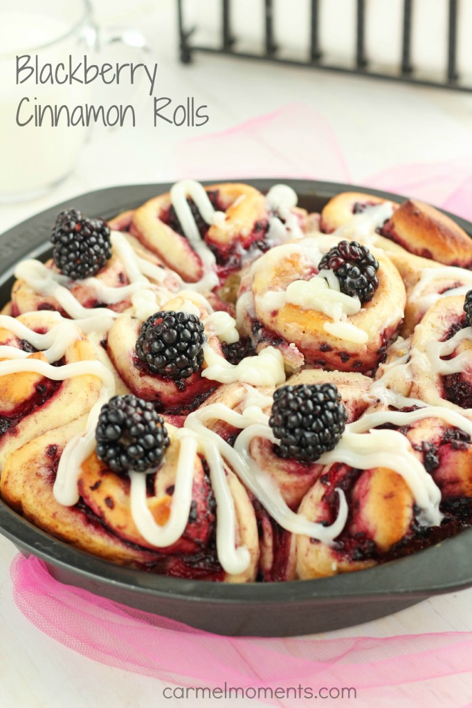 Blackberry Cinnamon Rolls - Homemade soft cinnamon rolls made with fresh blackberries. For summer brunch or breakfast. These yeast buns are a favorite. Cream Cheese drizzle topping makes them irresistible. 