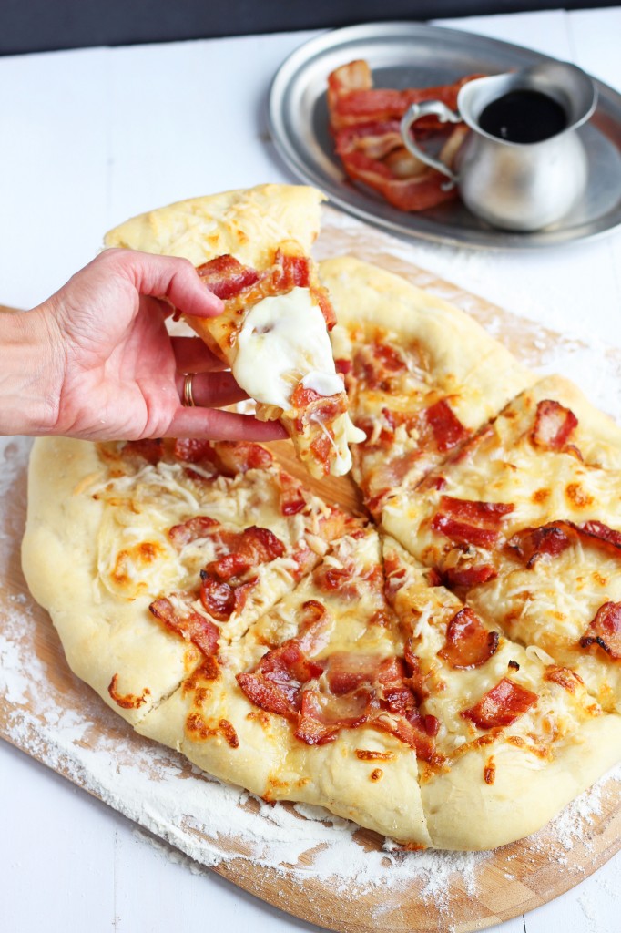  Maple, Bacon and Caramelized Onion Pizza - Fresh pizza with pure maple syrup, crisp bacon and caramelized onions on a bed of melty mozzarella and Romano cheeses. Savory and sweet with the perfect flavor.
