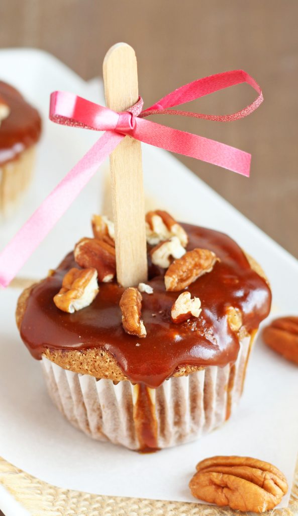 Caramel Apple Cupcakes - These perfect little cupcake are made with real apples and topped with delicious caramel glaze! | gatherforbread.com
