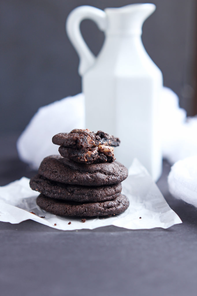 Chocolate Caramel Stuffed Cookies -- Soft dark chocolate cookie dough wrapped around Rolo candies for a perfect cookie #fbcookieswap| gatherforbread.com