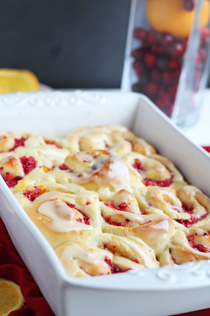 Cranberry Orange Sweet Rolls. Cinnamon like buns made with homemade dough. Fresh cranberries combined with delicious orange marmalade. Sunshine for your Christmas morning, these bake up beautifully.