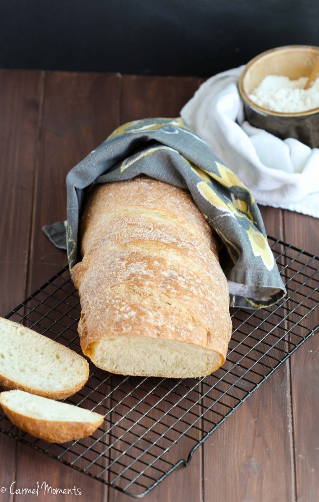 Rustic Italian Bread - This crusty Italian bread loaf makes the perfect addition to the dinner table. A great side for pasta, soup and Sunday dinner. 