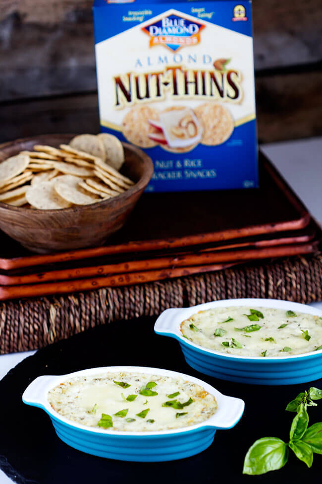 Garlic herb cheese dip. With only 5 ingredients this mixes and heats up in minutes. Perfect starter or appetizer. Serve with crackers, veggies or bread. Quick and delicious!