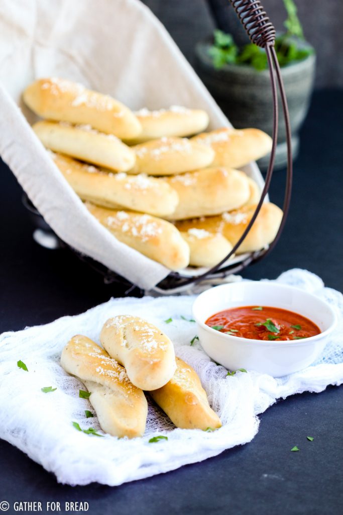 Soft Italian Breadsticks – These soft homemade bread sticks are SO easy to make . Topped with a cheese and herb mixture, the perfect addition to the bread basket at the dinner table. Bake up in 20 minutes,