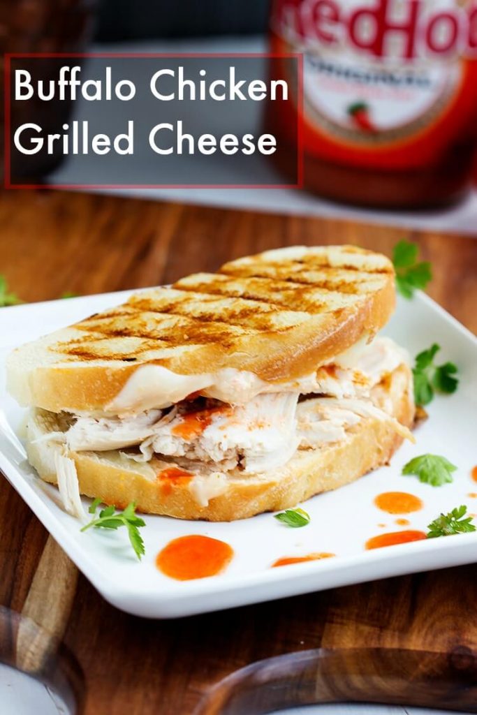 Buffalo Chicken Grilled Cheese - This grilled cheese sandwich bread is stuffed with melty cheese, rotisserie chicken smothered with hot sauce for the ultimate buffalo chicken sandwich.