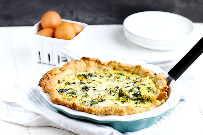 Spinach and Broccoli Quiche - Favorite breakfast quiche made with fresh vegetables; spinach, broccoli, onion and garlic with fresh eggs and cheddar.
