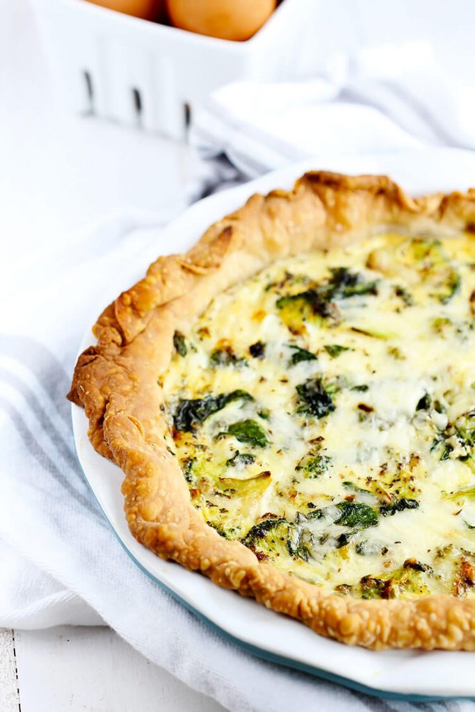 Spinach and Broccoli Quiche - Favorite breakfast quiche made with fresh vegetables; spinach, broccoli, onion and garlic with fresh eggs and cheddar.