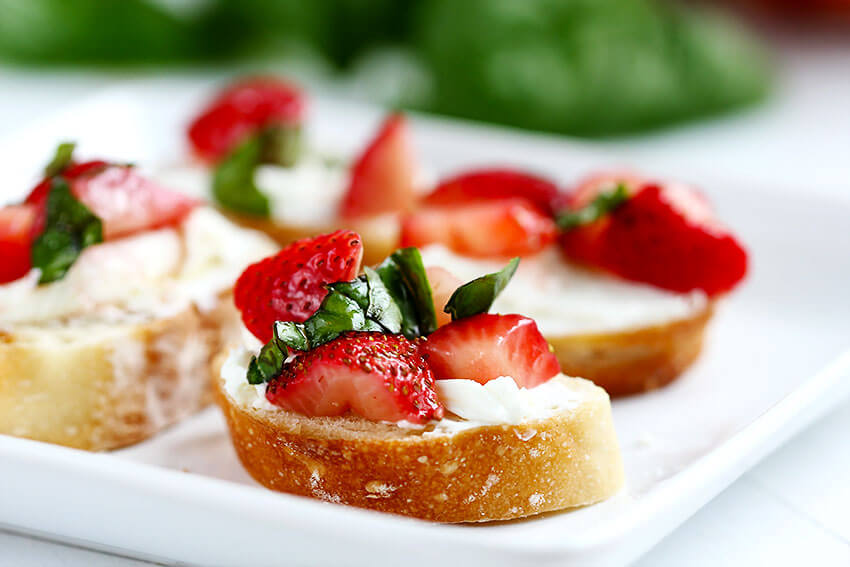 Strawberry Goat Cheese Bruschetta - Simple flavorful bruschetta made with simple fresh ingredients like goat cheese and strawberries. Table ready appetizer in 20 minutes.