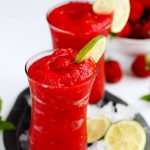 Strawberry Lime Slush - Fruit slushies are the perfect summer drink. Made with real fruit these are easy to make at home and you'll be sipping this icee drink in minutes.