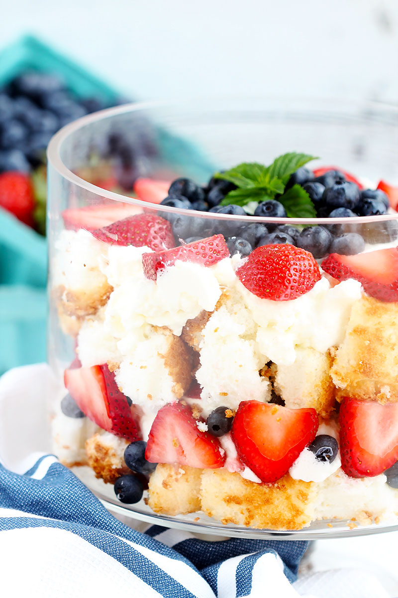 Berry Angel Food Cake Trifle - Angel food cake with fresh strawberries, blueberries and whipped cream makes a beautiful summer dessert with only 5 ingredients. Low sugar, whole real ingredients.