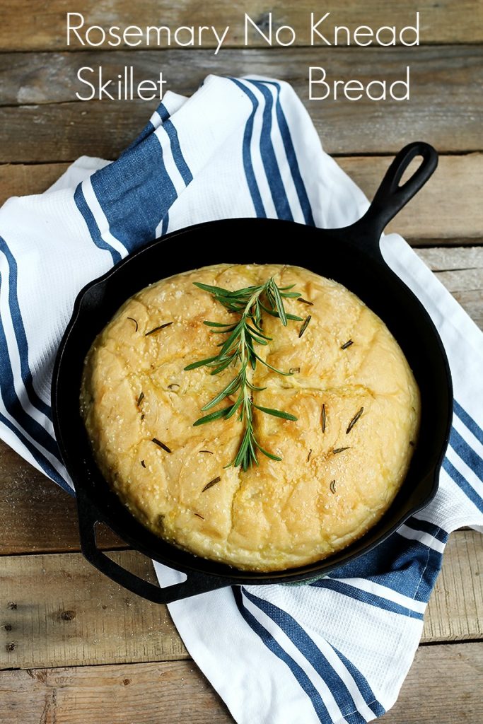 Rosemary No Knead Skillet Bread - Delicious and easy, this loaf bakes up quickly. Fresh, simple - olive oil, rosemary and seasoning for the perfect rise yeast bread in a skillet.