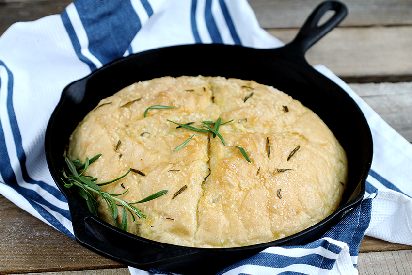 Delicious and easy, this loaf bakes up quickly. Fresh, simple olive oil, rosemary and seasoning for the perfect rise and bake yeast bread in a skillet.