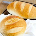Easy Perfect Yeast Bread - Simple no fail yeast bread makes 2 delicious artisan loaves. So easy you'll make this recipe often. Perfect versatile loaf for dinner, sandwiches and more!