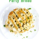 Easy Cheesy Party Bread - Garlic, buttery, pull apart mozzarella, this cheesy bread is the perfect easy appetizer for parties, game time and summer picnics.