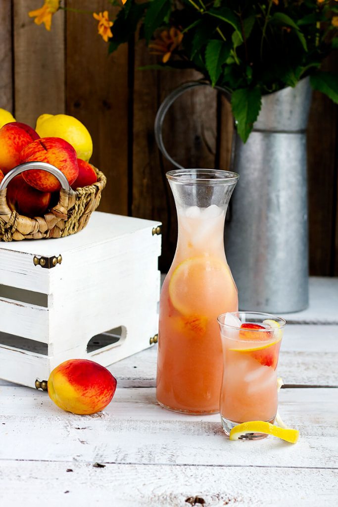 Fresh Peach Lemonade // gatherforbread.com - Refreshing summer favorite, made simple with fresh juicy peaches and lemons for a delicious thirst quencher.