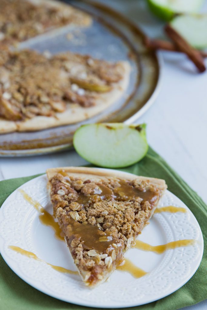 Apple Crisp Pizza - Delicious apples with a crispy oat topping made into pizza. // gatherforbread.com