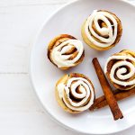 Mini Cinnamon Rolls - These homemade mini rolls are perfect for breakfast and desserts. Grab and go style wrapped up with buttery cinnamon goodness and topped with a delicious cream cheese glaze. // gatherforbread.com