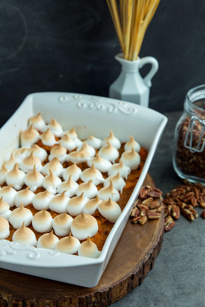 Sweet potato casserole baked with simple ingredients like pure maple syrup. Topped with homemade marshmallow meringue for a perfect Thanksgiving side dish. // gatherforbread.com