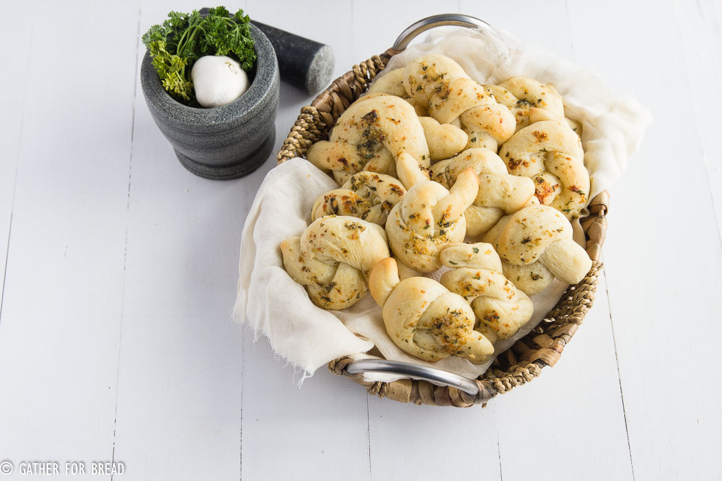 Homemade Garlic Parmesan Knots - Soft, knots topped with Fresh Parmesan, butter and garlic. | gatherforbread.com