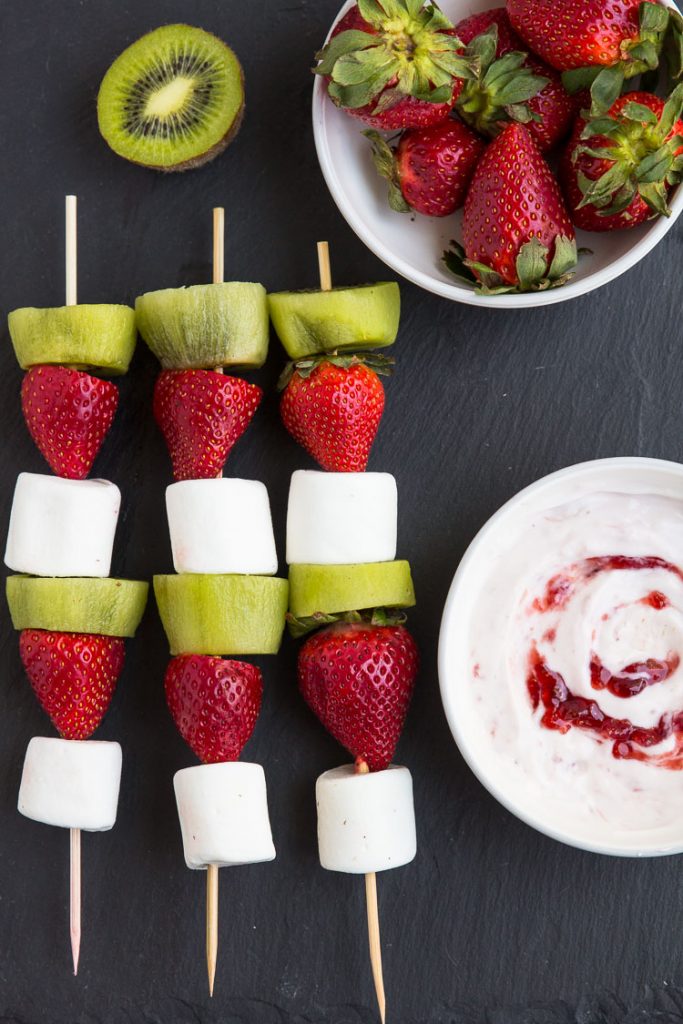 Strawberry Kiwi Kabobs - Simple, snack made in minutes with fresh strawberries, kiwi marshmallows. Easy fun, snack paired with Strawberry Greek yogurt dip