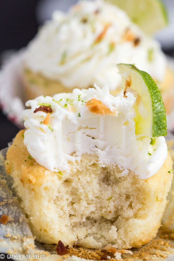 Coconut Lime Cupcakes - Fluffy, delicious cupcakes with hints of lime and sweet coconut. | gatherforbread.com