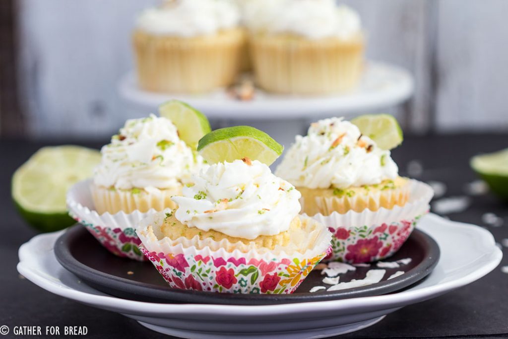 Coconut Lime Cupcakes - Fluffy, delicious cupcakes with hints of lime and sweet coconut. | gatherforbread.com
