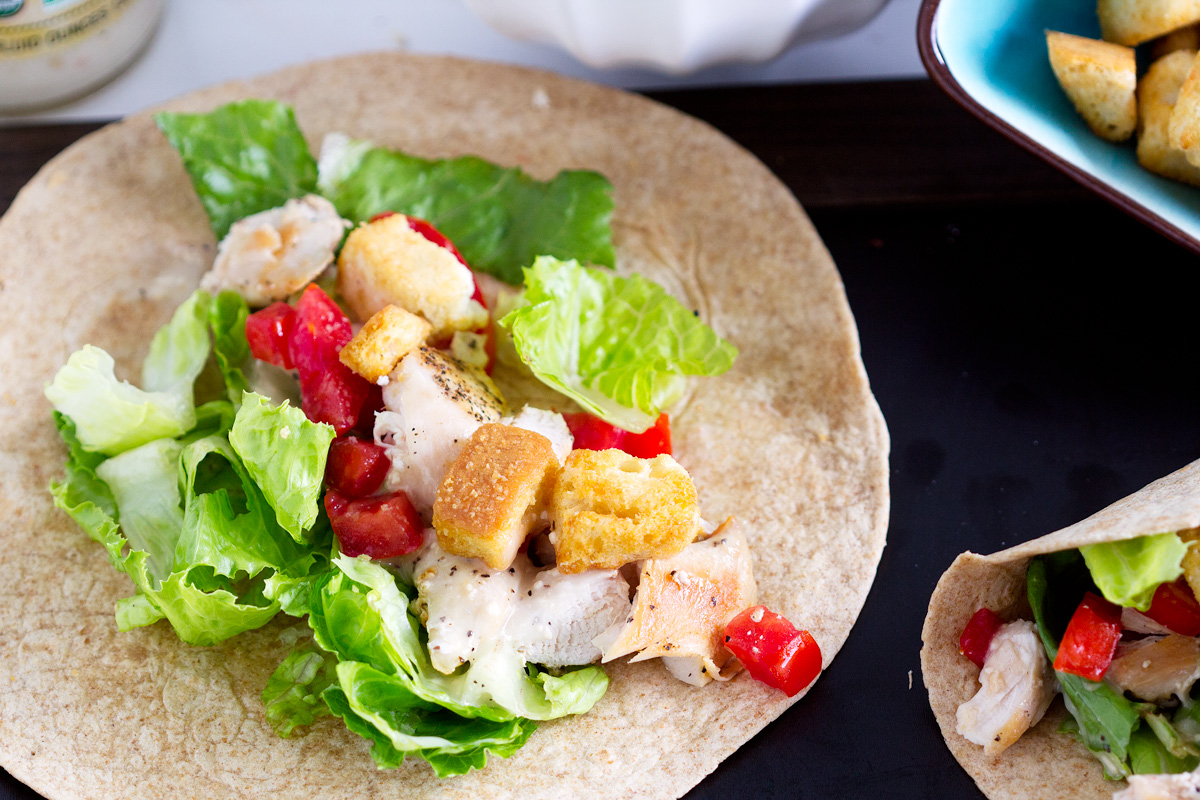 Chicken Caesar Wraps - Quick easy meal in 20 mins Chicken, romaine lettuce, tomatoes, croutons and Caesar dressing make a simple easy lunch or dinner.