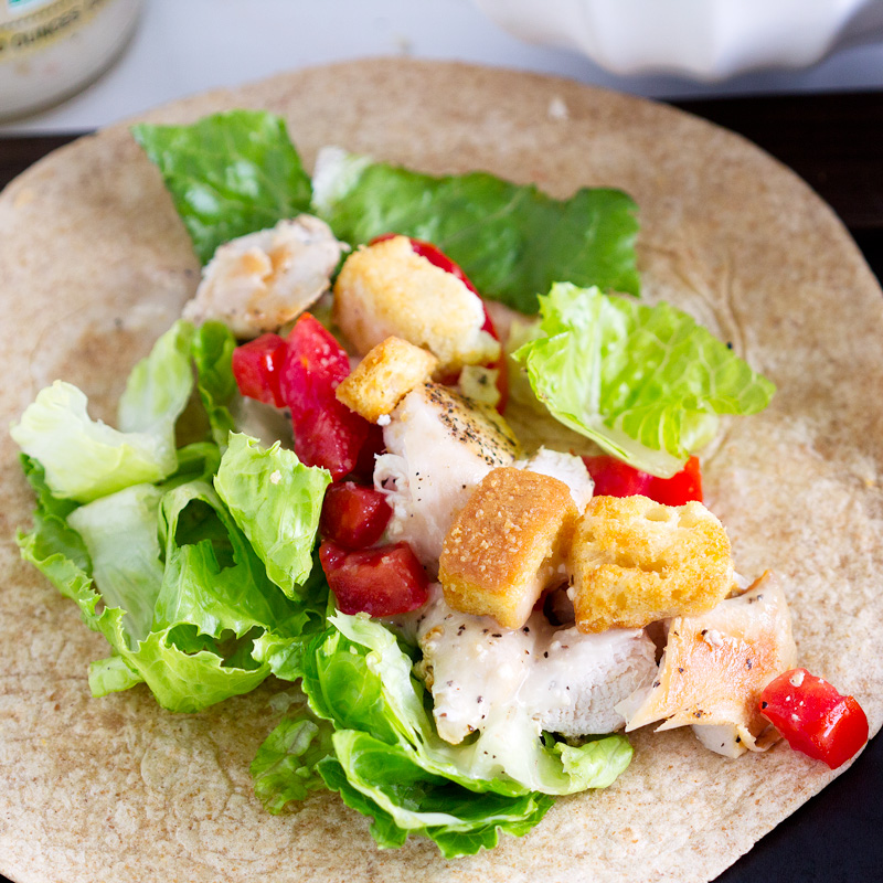 Chicken Caesar Wraps - Quick easy meal in 20 mins Chicken, romaine lettuce, tomatoes, croutons and Caesar dressing make a simple easy lunch or dinner.