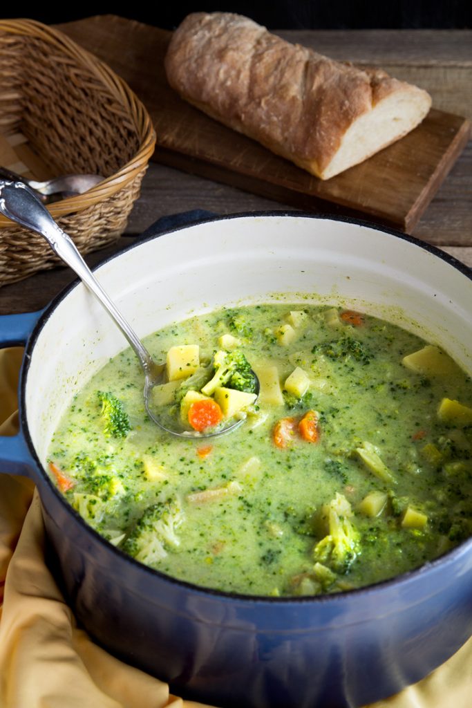 Broccoli Potato Cheese Soup - Cheesy broccoli soup recipe has broccoli flowerets, potatoes, sharp cheddar cheese and vegetables for a comforting bowl of yum.