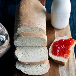 Basic Homemade White Bread - Simple and easy homemade white bread made with all purpose flour. This loaf is perfect for sandwiches, toast or to slather with jelly.