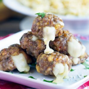 Mozzarella Stuffed Sausage Meatballs and Pasta- Homemade Italian Sausage stuffed with mozzarella cheese meatballs. Perfect for entertaining, parties, dinner and freezing for later.