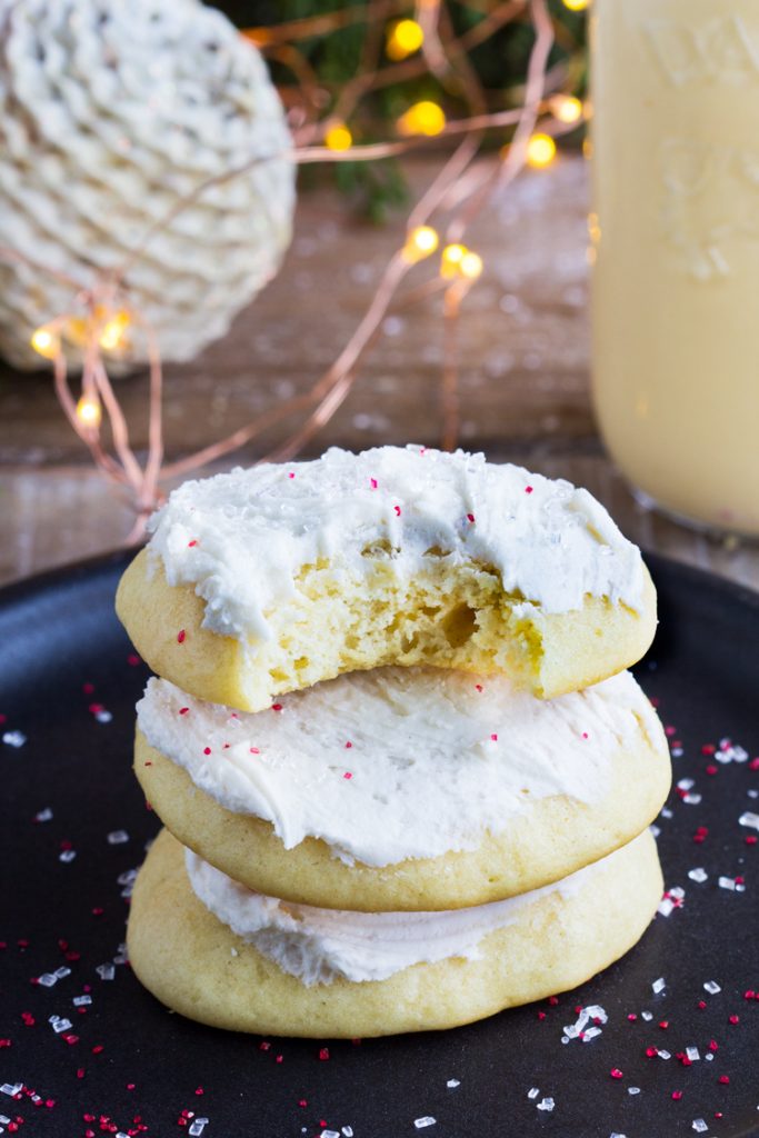 Eggnog Sugar Cookies - Soft sugar cookies made with eggnog and frosted with a simple sweet eggnog frosting. Perfect to give and serve for Christmas and the holidays. | #COOKIES #EGGNOG #SUGARCOOKIES #CHRISTMAS #HOLIDAYS #FOODGIFTS #FROSTED