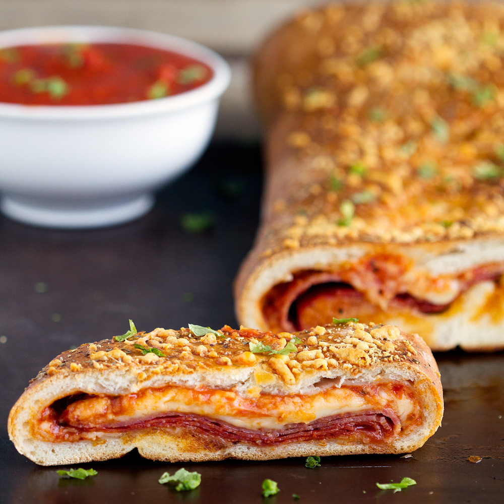 How to Make Stromboli - Recipe for how to make homemade stromboli made with pizza dough. Real dough, stuffed pepperoni salami and cheeses for an authentic Italian dinner.