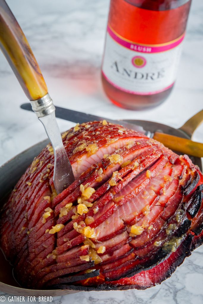 Champagne Baked Ham Champagne maple syrup pineapple combine for delicious glaze over boneless baked ham. Easter and Christmas dinner favorite. Great recipe to feed a crowd.