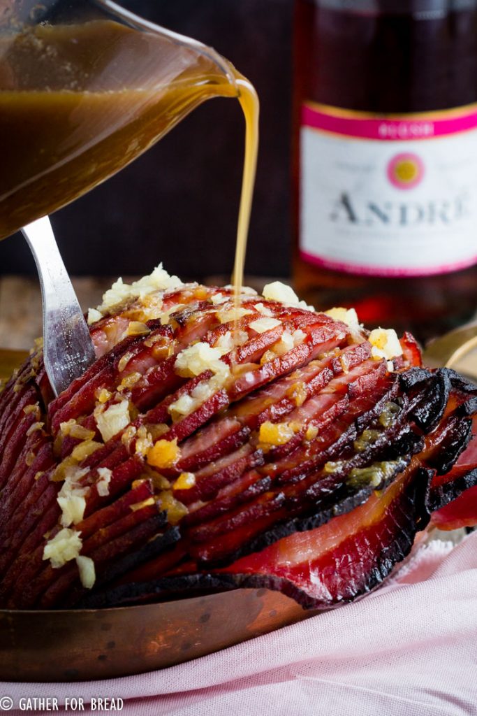Champagne Baked Ham Champagne maple syrup pineapple combine for delicious glaze over boneless baked ham. Easter and Christmas dinner favorite. Great recipe to feed a crowd.