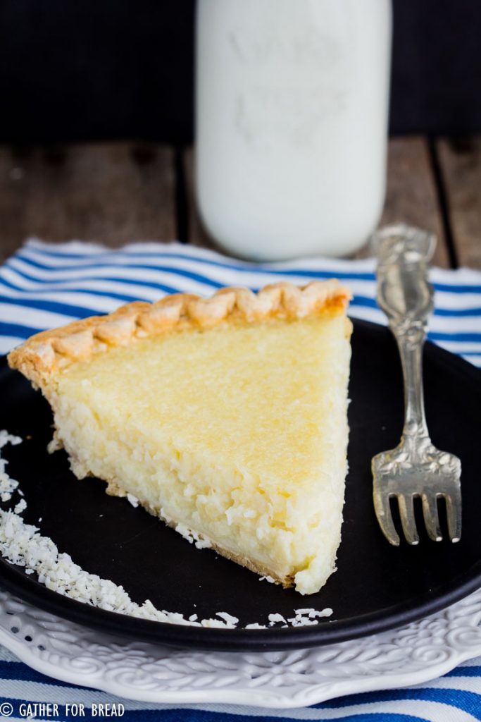 Homemade Coconut Custard Pie - Flaky coconut pie made with real custard baked in a pie crust for a perfect old fashioned taste, just like grandma made. Real ingredients like eggs, coconut milk and organic sugar.