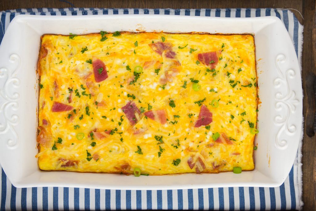 Cheesy Amish Breakfast Casserole - Breakfast bake recipe with bacon, hash browns, cheese, cottage cheese. Comfort food perfect for weekend breakfast or brunch. Taste of Home