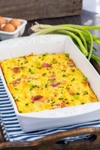 Cheesy Amish Breakfast Casserole - Breakfast bake recipe with bacon, hash browns, cheese, cottage cheese. Comfort food perfect for weekend breakfast or brunch. Taste of Home