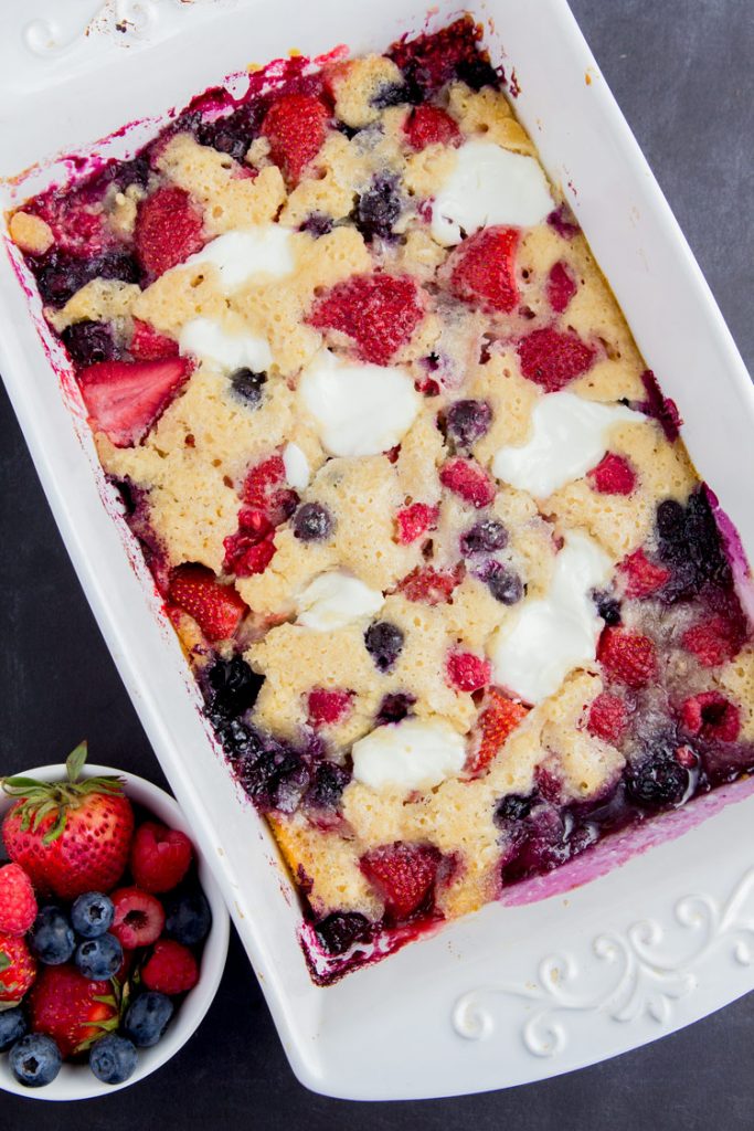 Berry Cream Cobbler- Lighter, healthy, low-fat cobbler recipe mad easy with Greek yogurt, white whole wheat flour, less sugar. Mixed berries, blueberry, strawberry, raspberry. You won't miss the old fashioned version.