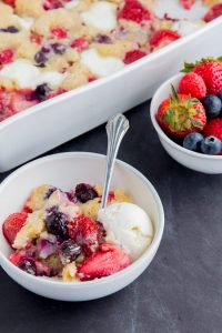 Berry Cream Cobbler- Lighter, healthy, low-fat cobbler recipe mad easy with Greek yogurt, white whole wheat flour, less sugar. Mixed berries, blueberry, strawberry, raspberry. You won't miss the old fashioned version.